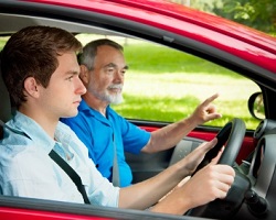 learner driver in a car with instructor