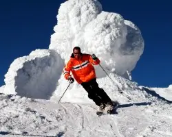 skier coming down mountain