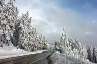 winter car hire snowy road