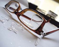 Broken pair of spectacles
