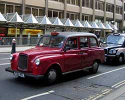 Black cab parked on a street