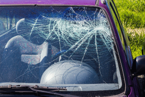 car with smashed windscreen which is covered by car hire excess insurance